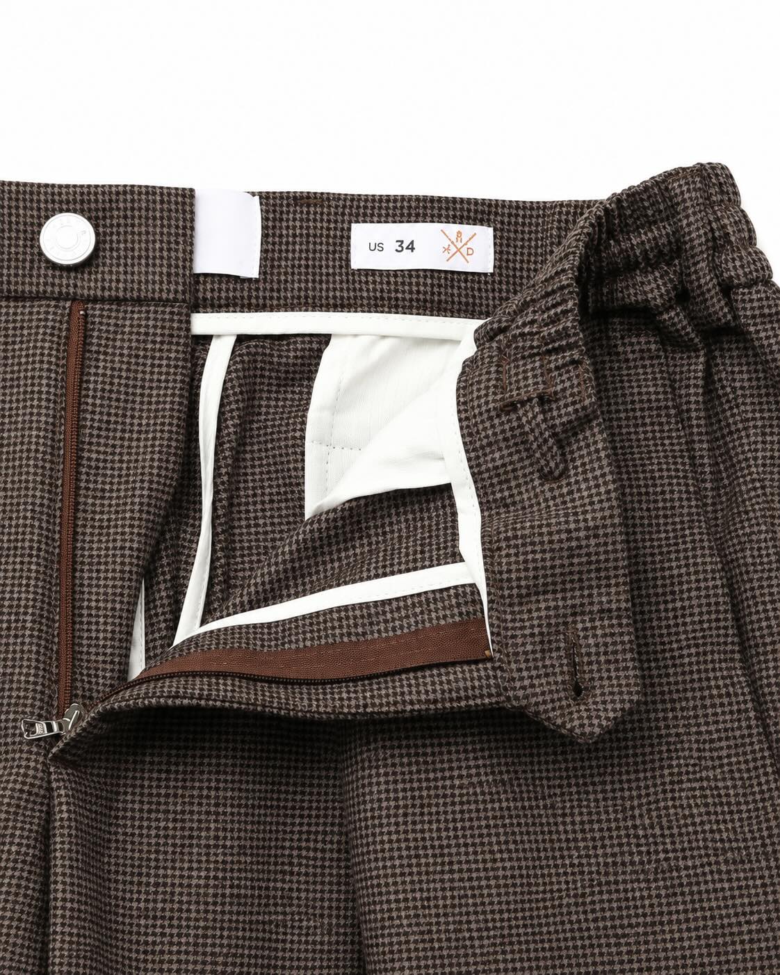 Pleated trousers in virgin wool with houndstooth pattern