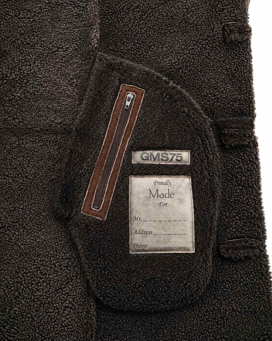 Long jacket made of sheepskin and real fur in dark brown